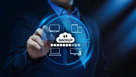 Cloud backup concept showing data sync across laptop, desktop, tablet, and smartphone devices — data integrity and protection strategy